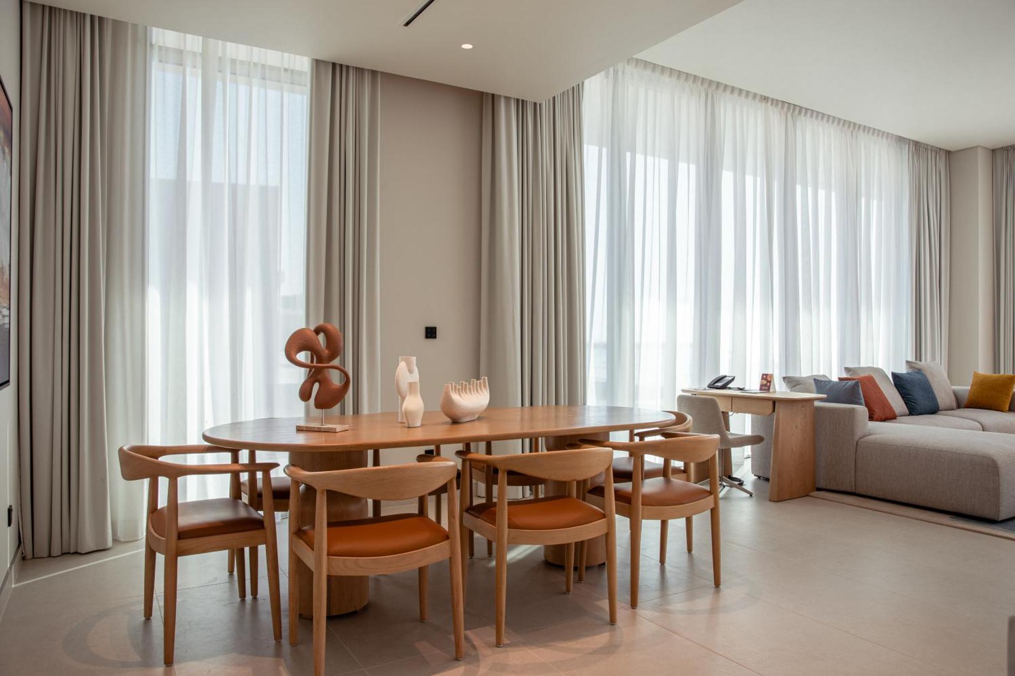 Ajman Hotel & Villas By Blazon Hotels Εξωτερικό φωτογραφία A dining room