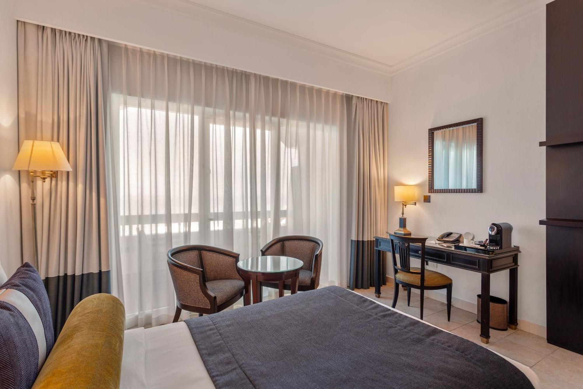 Ajman Hotel & Villas By Blazon Hotels Εξωτερικό φωτογραφία A room at the hotel