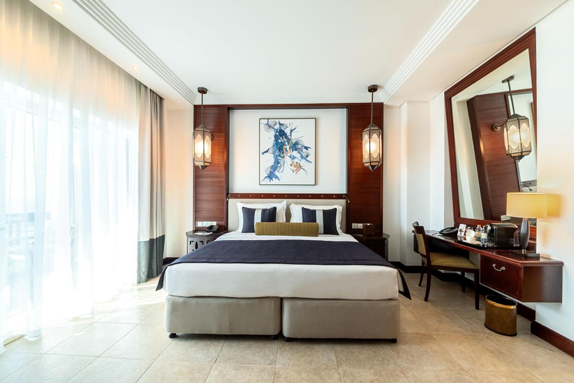 Ajman Hotel & Villas By Blazon Hotels Εξωτερικό φωτογραφία A bedroom at the hotel